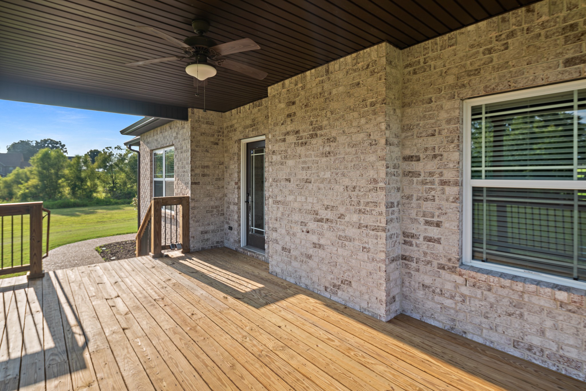 330 Bates Road Lebanon, TN 37087 - Photo 38 of 53 a view of a backyard with wooden floor and floor to ceiling window