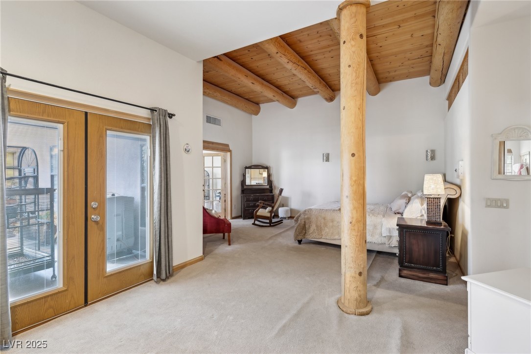 519 North Racetrack Road Henderson, NV 89015 - Photo 49 of 98 Bedroom with wooden ceiling, visible vents, access to exterior, french doors, and beamed ceiling