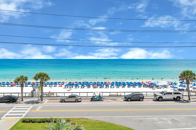 a front view of a building with outdoor space