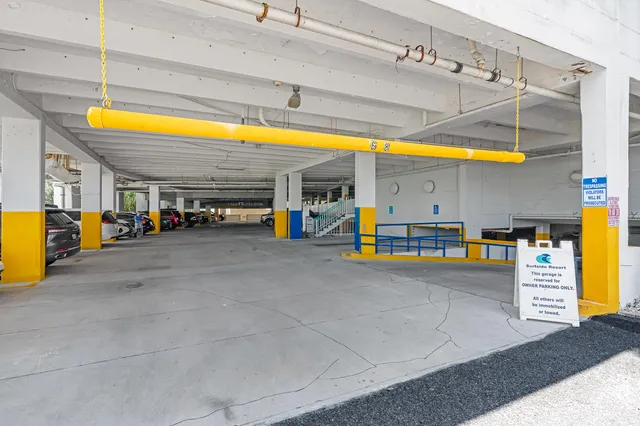 a small pool is sitting in front of a building