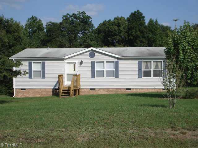 528 Rat Castle Road Pelham, NC 27311 - Photo 1 of 9 Exterior Front.