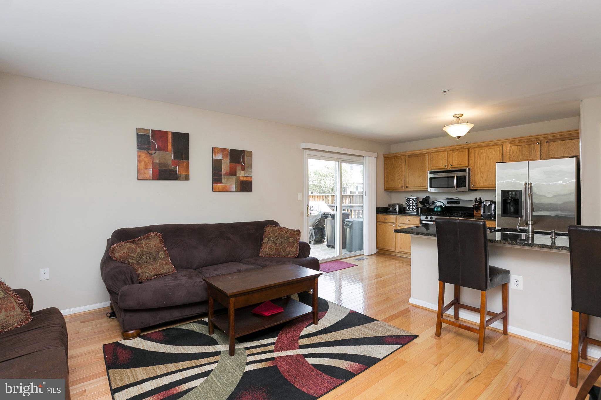 254 Pidco Road Reisterstown, MD 21136 - Photo 10 of 30 Kitchen / Family Room with Hardwood Floors