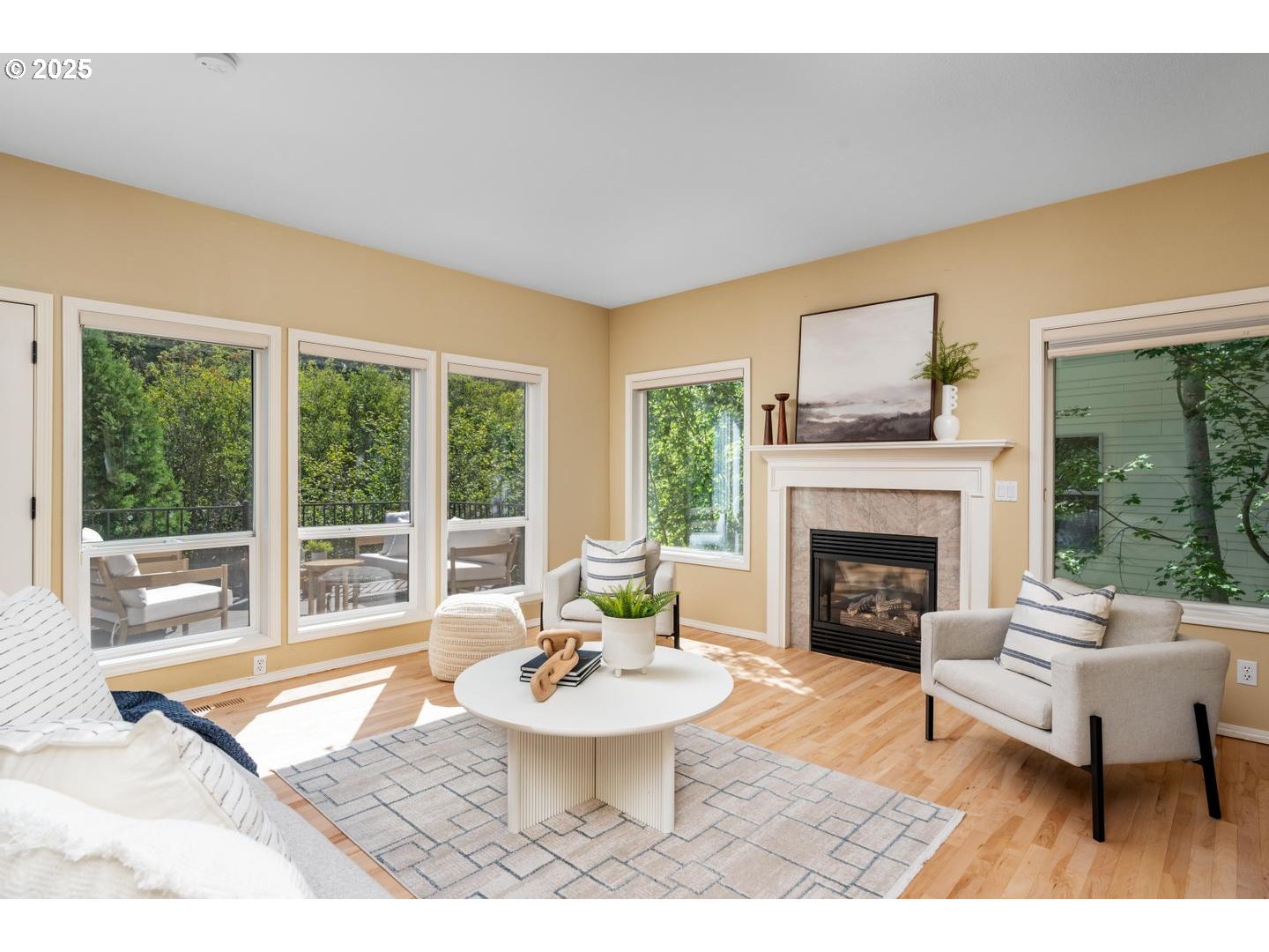 2118 Northwest Mill Pond Road Portland, OR 97229 - Photo 11 of 44 a living room with furniture and a fireplace