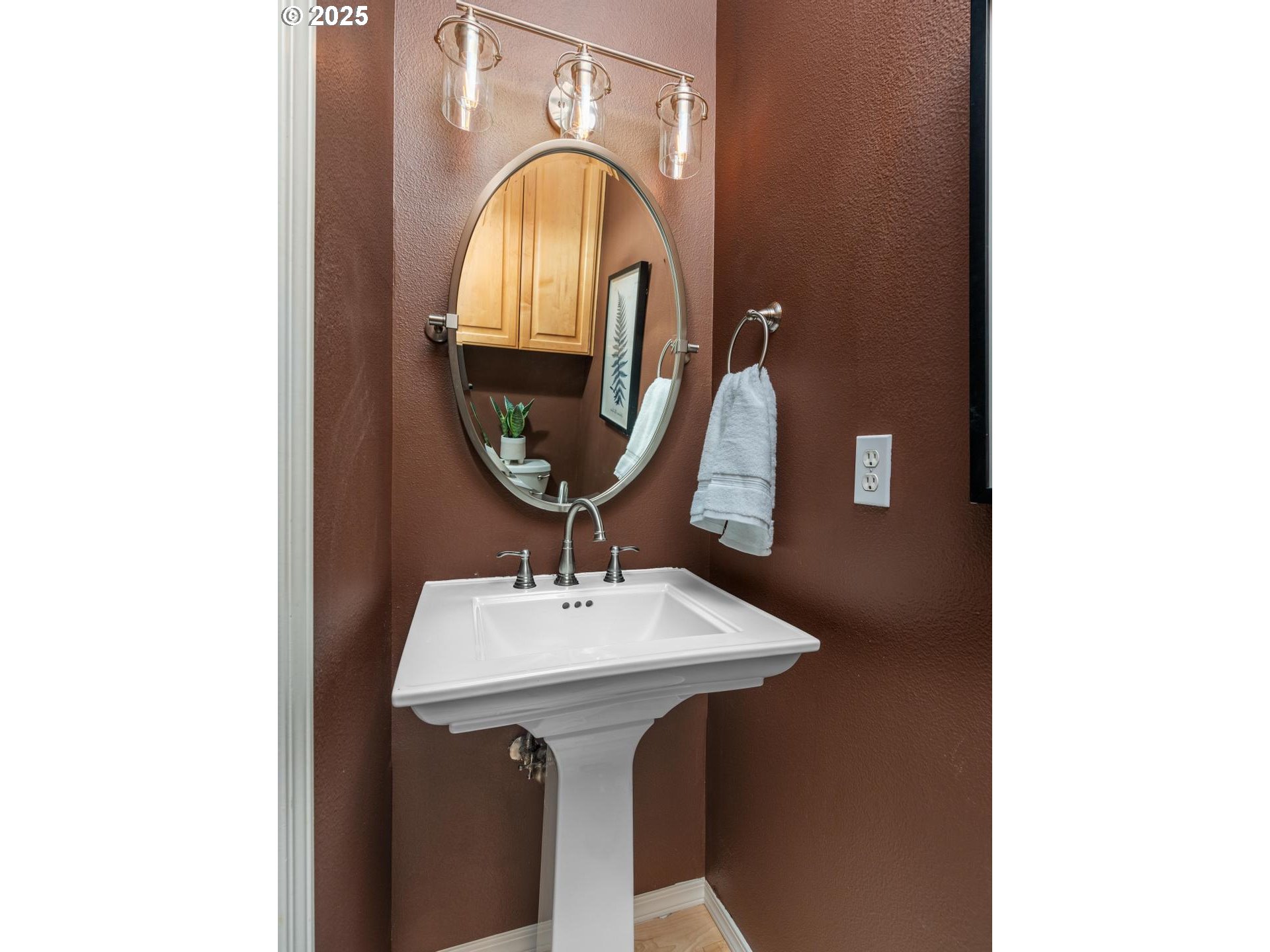 2118 Northwest Mill Pond Road Portland, OR 97229 - Photo 18 of 44 a bathroom with a sink and a mirror