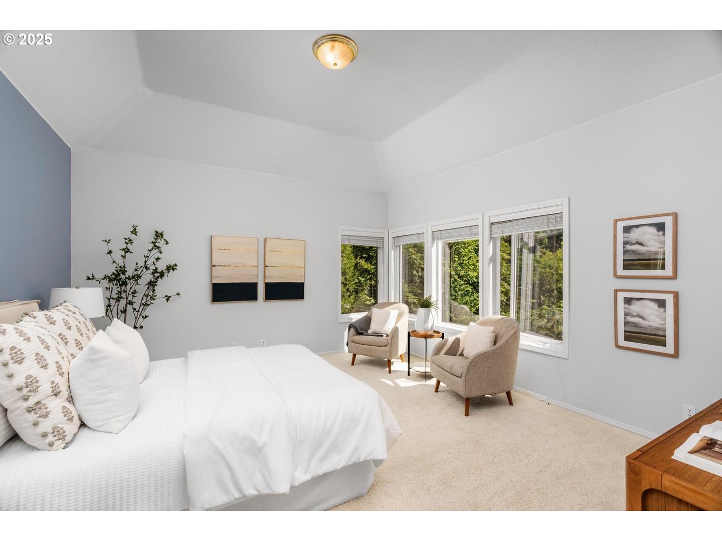 2118 Northwest Mill Pond Road Portland, OR 97229 - Photo 21 of 44 a bedroom with furniture and a large window