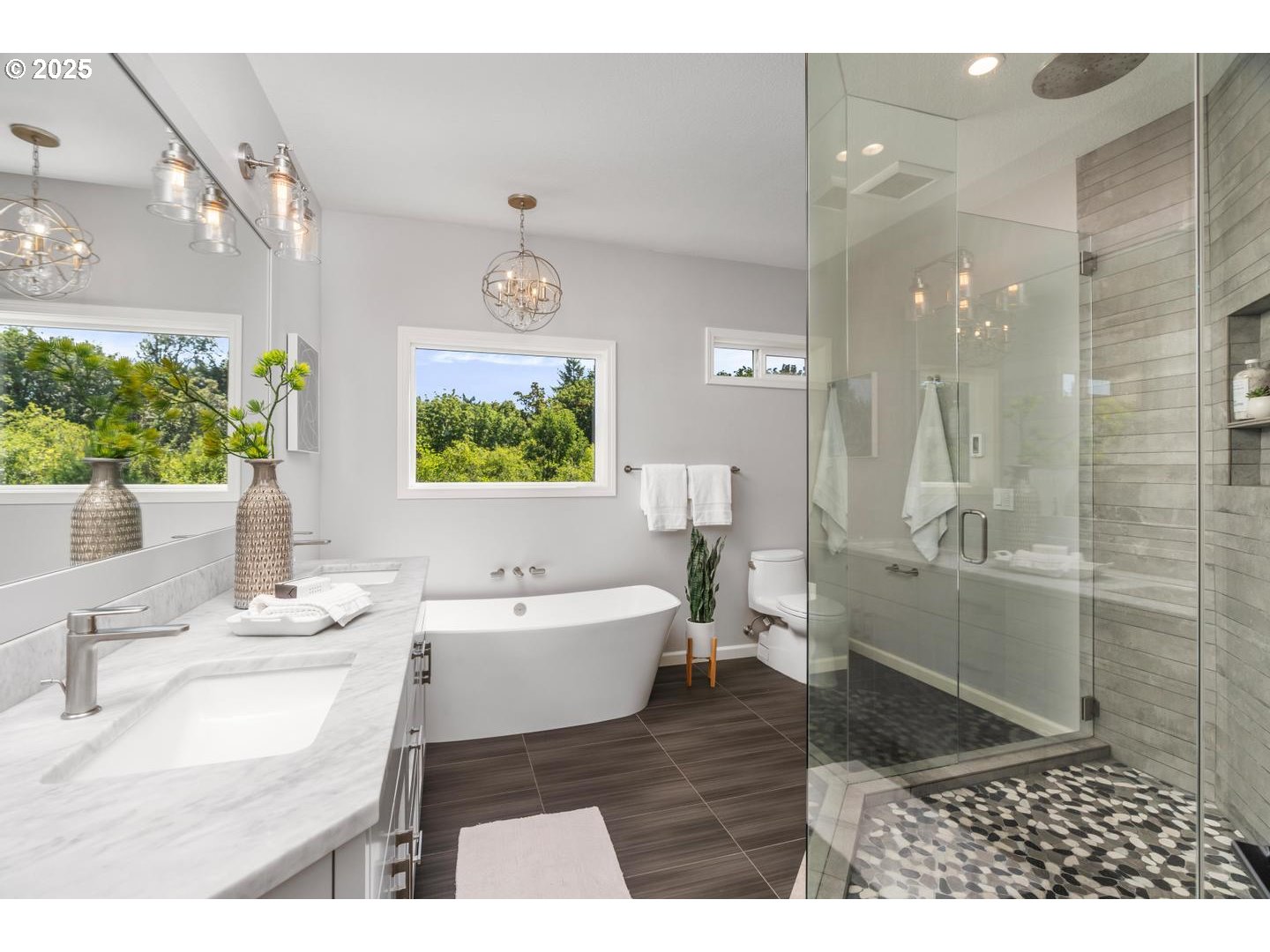 2118 Northwest Mill Pond Road Portland, OR 97229 - Photo 23 of 44 a bathroom with a sink a toilet and shower