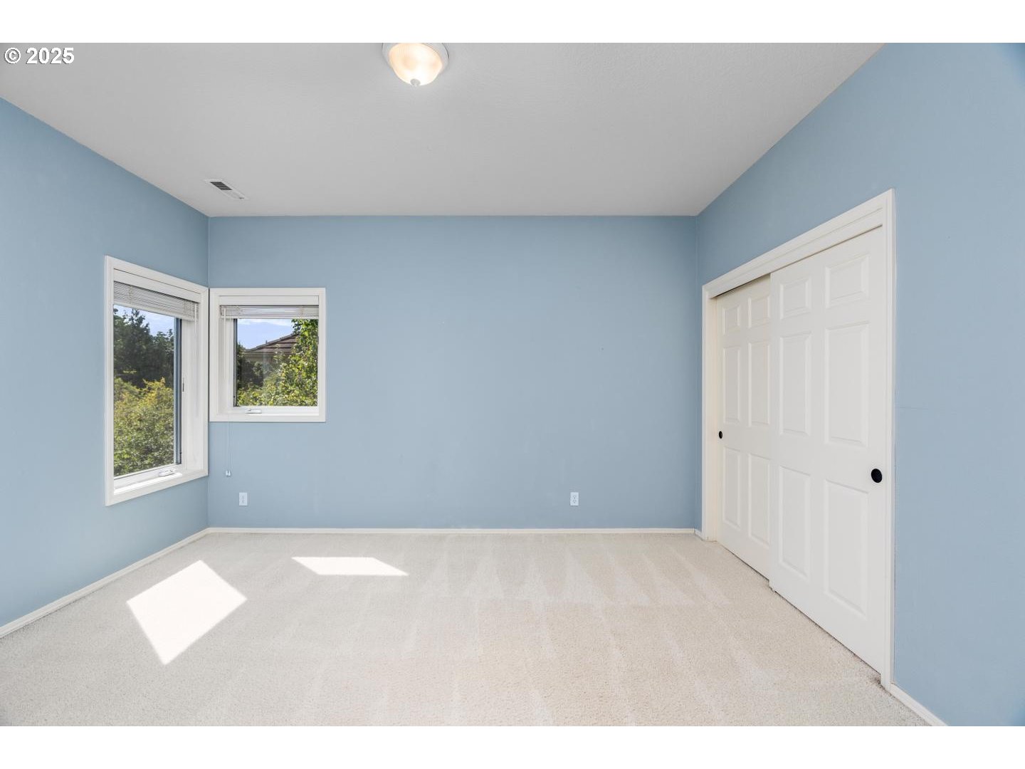 2118 Northwest Mill Pond Road Portland, OR 97229 - Photo 26 of 44 a view of an empty room with a window