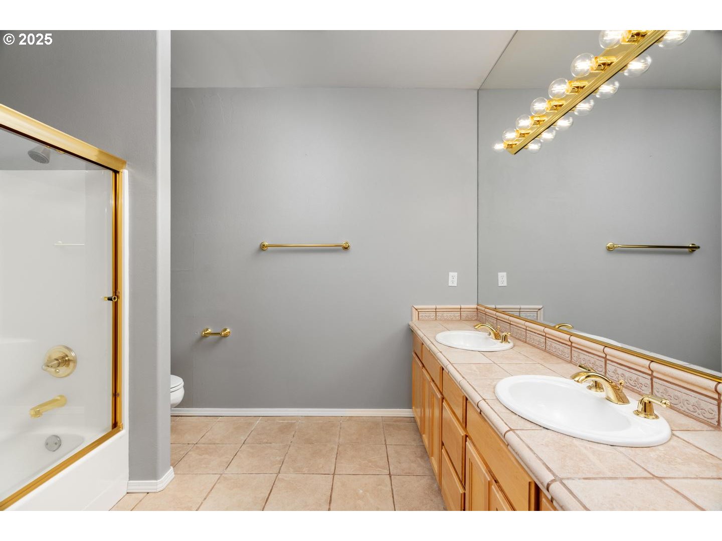 2118 Northwest Mill Pond Road Portland, OR 97229 - Photo 32 of 44 a bathroom with a sink a vanity and a mirror