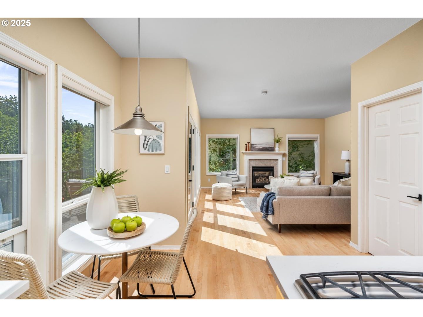 2118 Northwest Mill Pond Road Portland, OR 97229 - Photo 10 of 44 a living room with furniture and a fireplace