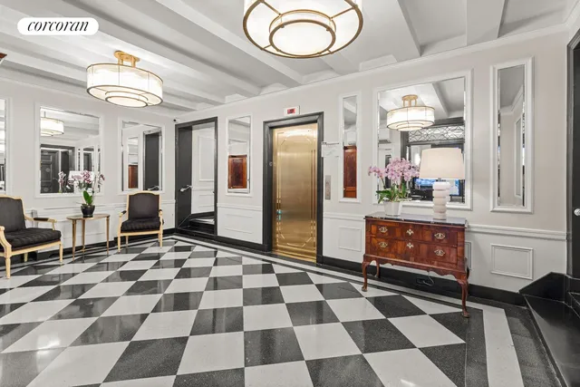 a room with a black white checkered floor and a black white checkered floor