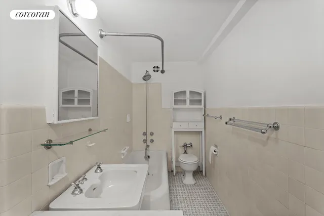 a kitchen that has a sink and cabinets