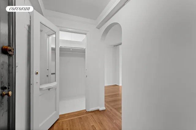 a bathroom with a bathtub shower sink vanity and toilet