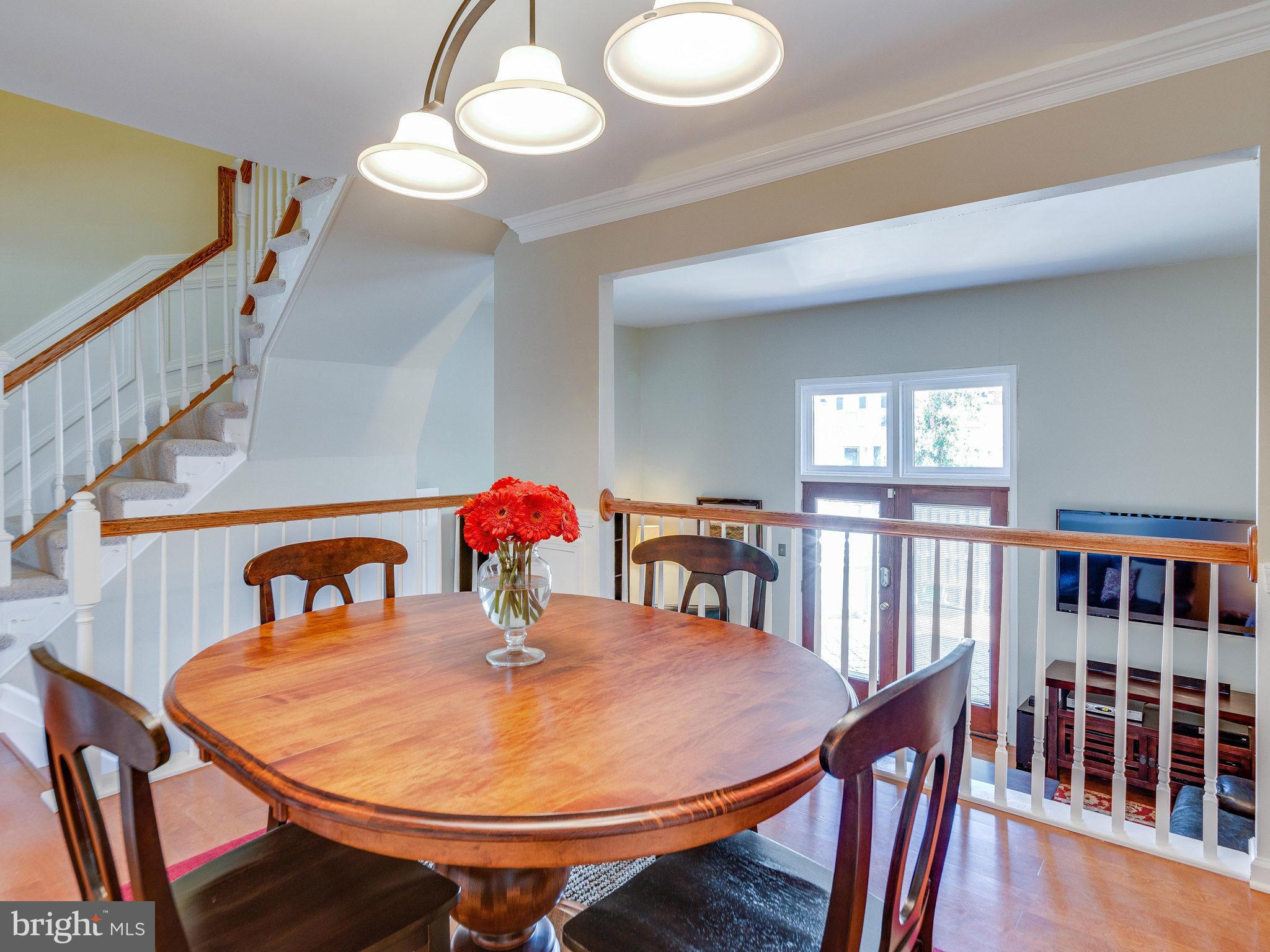 11931 Travistock Court Reston, VA 20191 - Photo 8 of 29 Dining Room overlooking Living Room