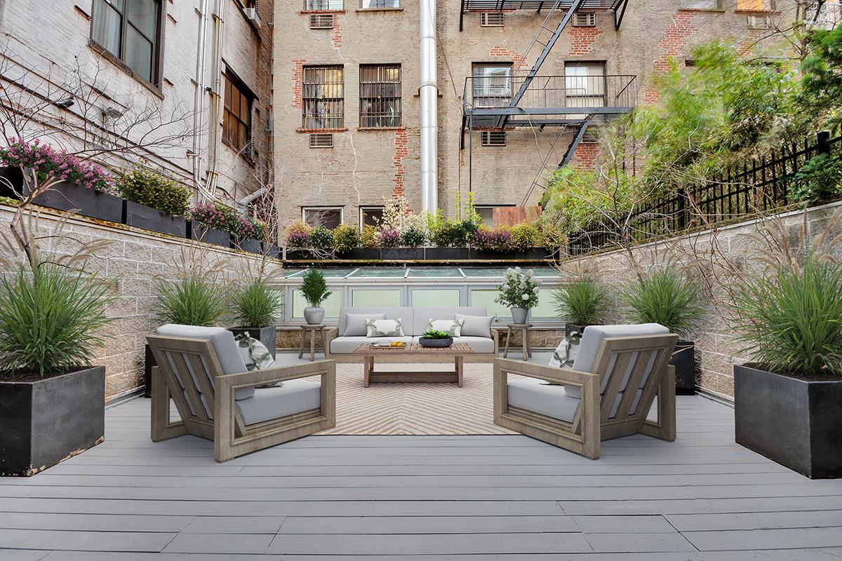 a swimming pool with outdoor seating and plants