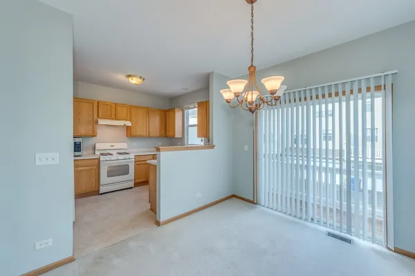 $209,000 | 1492 Cambria Drive, Unit 6, DeKalb, IL 60115