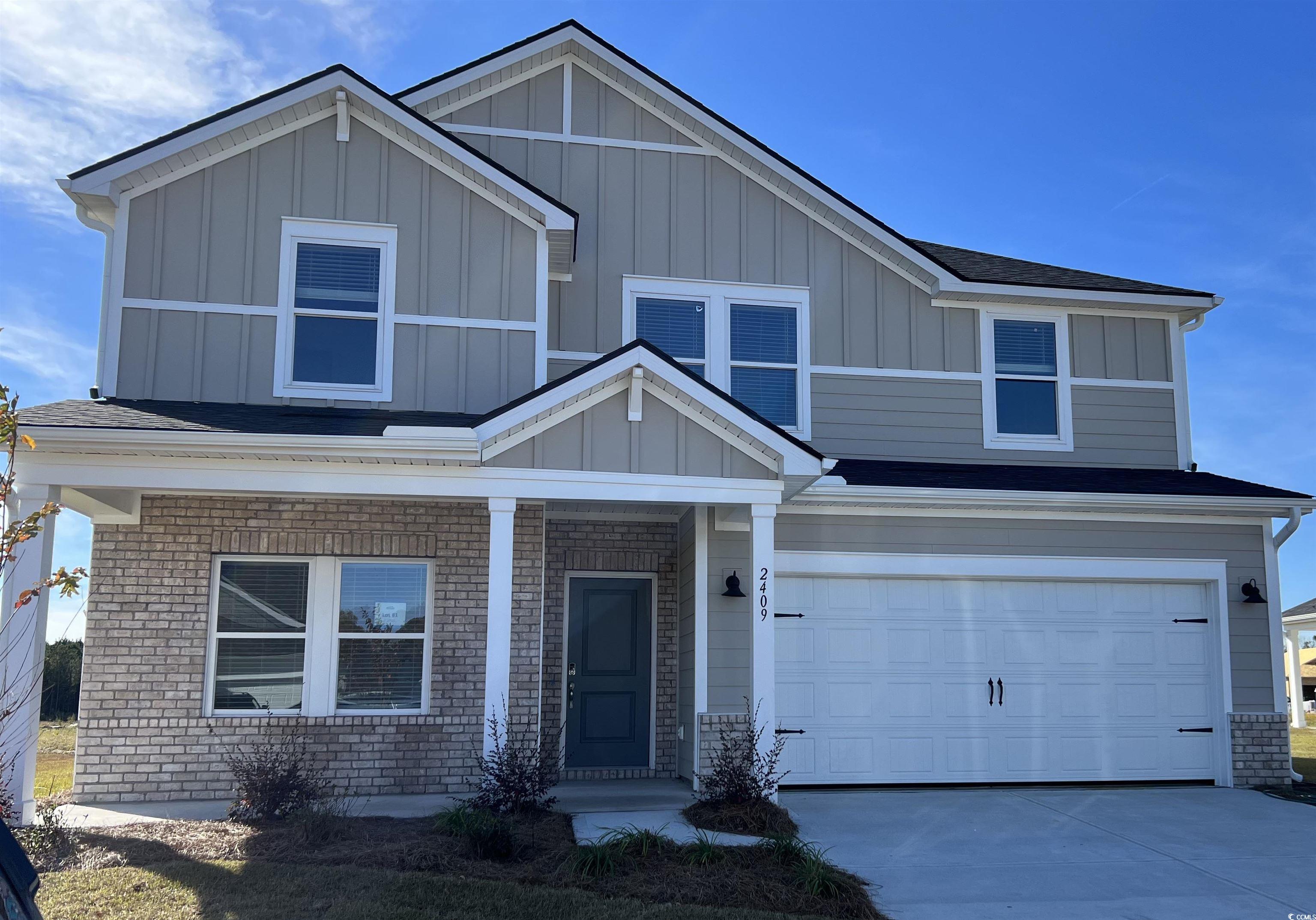 2409 Copper Crk Loop, Unit WATERSIDE Longs, SC 29568 - Photo 1 of 27 View of front of home with a garage