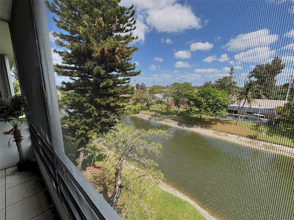 4310 Northwest 12th Court, Unit 308 Lauderhill, FL 33313 - Photo 12 of 24 a view of lake from window