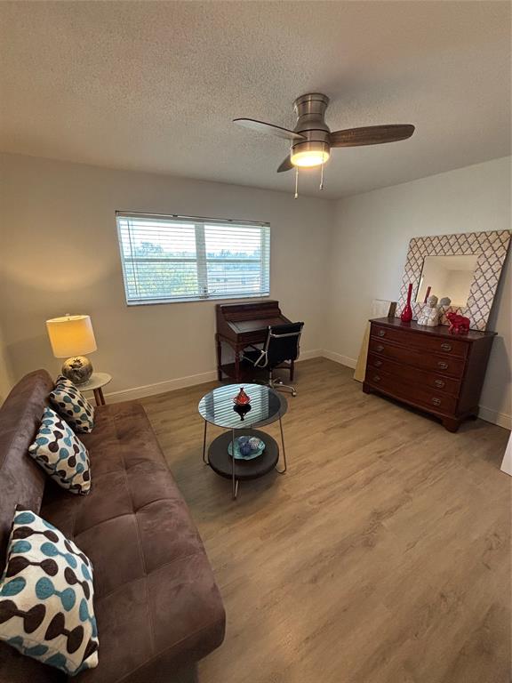 4310 Northwest 12th Court, Unit 308 Lauderhill, FL 33313 - Photo 13 of 24 a room with furniture and a window