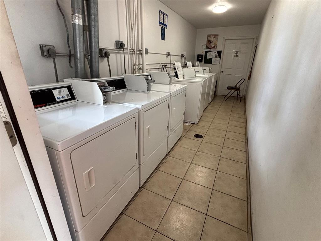 4310 Northwest 12th Court, Unit 308 Lauderhill, FL 33313 - Photo 20 of 24 a utility room with dryer and washer