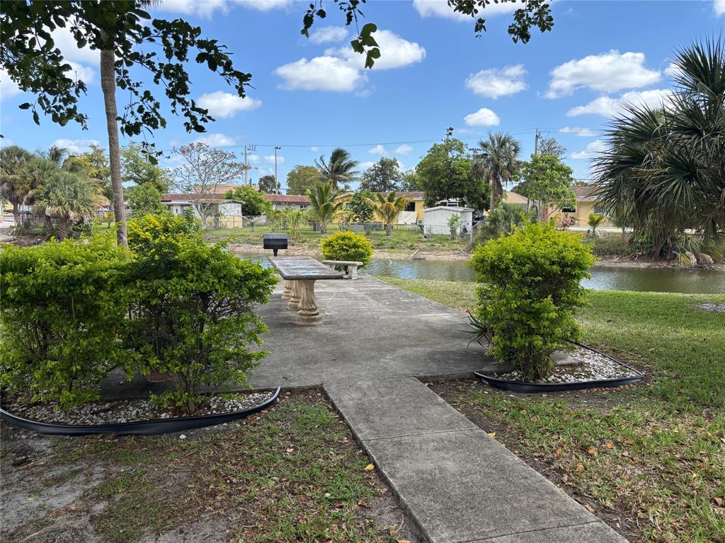 4310 Northwest 12th Court, Unit 308 Lauderhill, FL 33313 - Photo 21 of 24 a view of a backyard