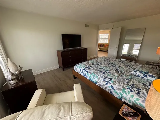 a living room with a couch and a flat screen tv