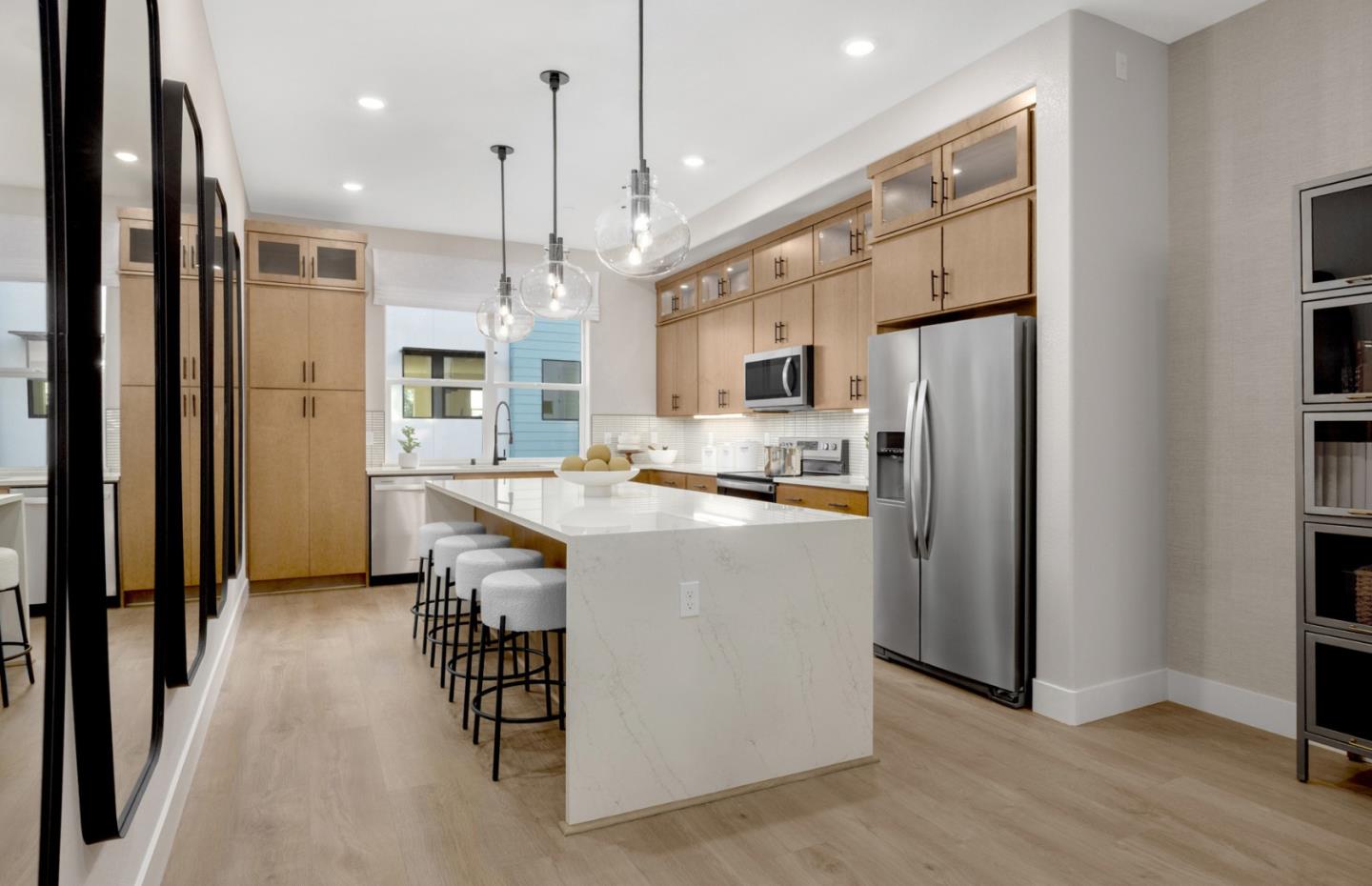 2457 Willow Way San Mateo, CA 94403 - Photo 8 of 13 a kitchen with kitchen island a counter top space a sink a refrigerator and a refrigerator