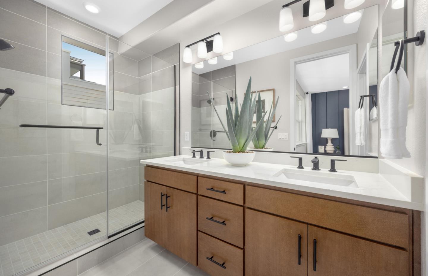 2457 Willow Way San Mateo, CA 94403 - Photo 10 of 13 a bathroom with a double vanity sink mirror and shower