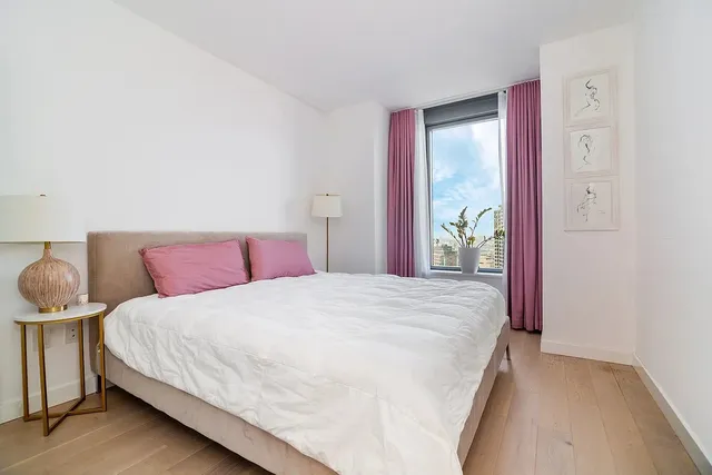 a bedroom with a bed and closet