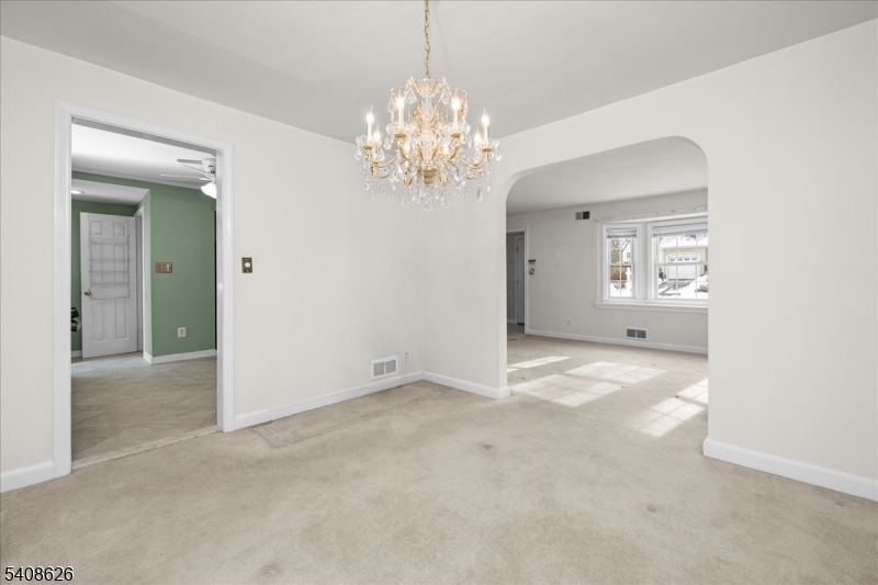 112 Union Street Cedar Grove, NJ 07009 - Photo 13 of 43 a view of an empty room with window