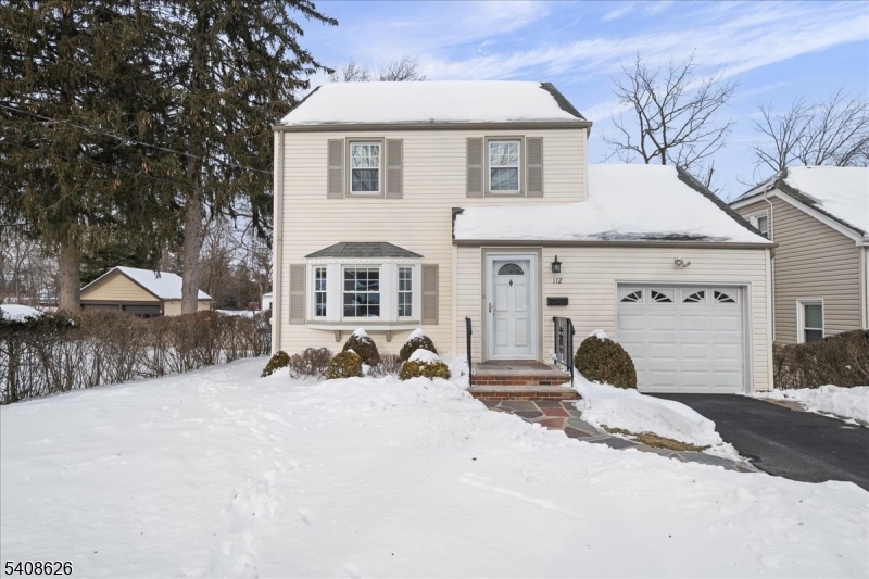 112 Union Street Cedar Grove, NJ 07009 - Photo 3 of 43 a view of a house with snow yard and sitting area