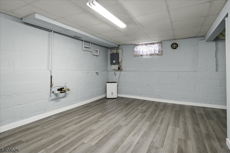 112 Union Street Cedar Grove, NJ 07009 - Photo 35 of 43 a view of an empty room and window