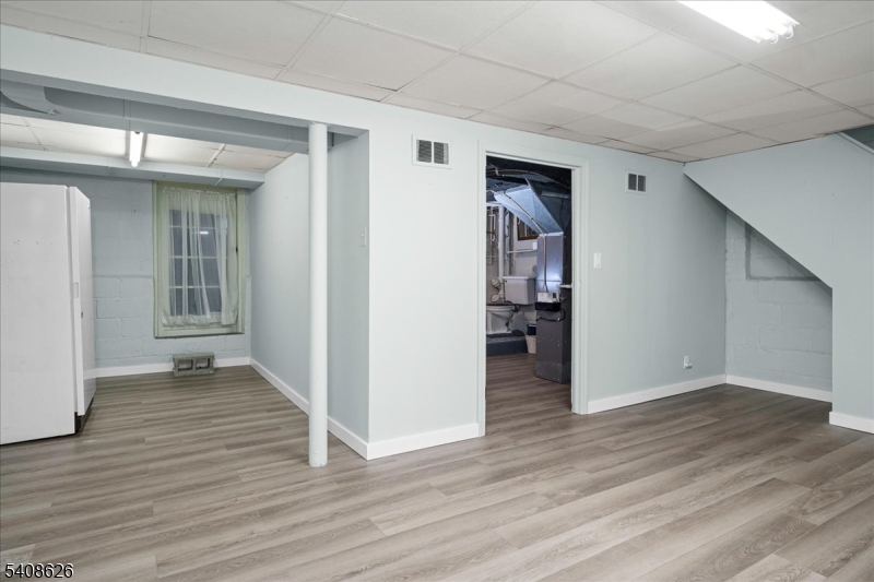 112 Union Street Cedar Grove, NJ 07009 - Photo 36 of 43 wooden floor in an empty room