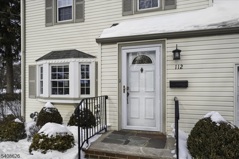 112 Union Street Cedar Grove, NJ 07009 - Photo 42 of 43 a front view of a house with a porch