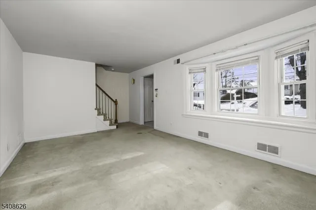 a view of an empty room with window