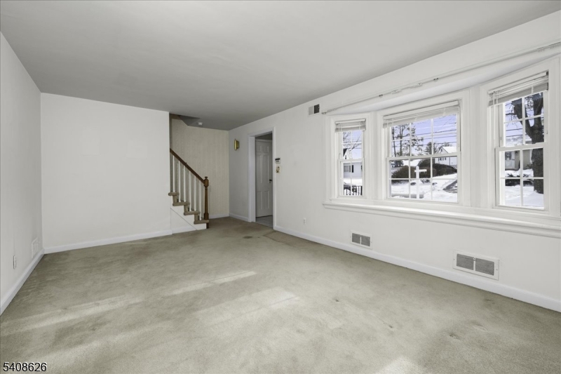 112 Union Street Cedar Grove, NJ 07009 - Photo 9 of 43 a view of an empty room with a window
