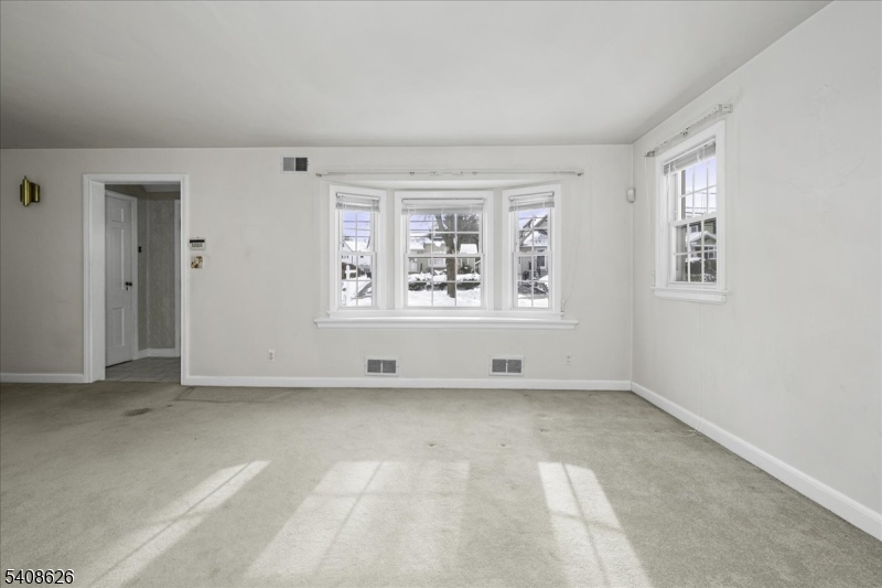 112 Union Street Cedar Grove, NJ 07009 - Photo 10 of 43 an empty room with windows