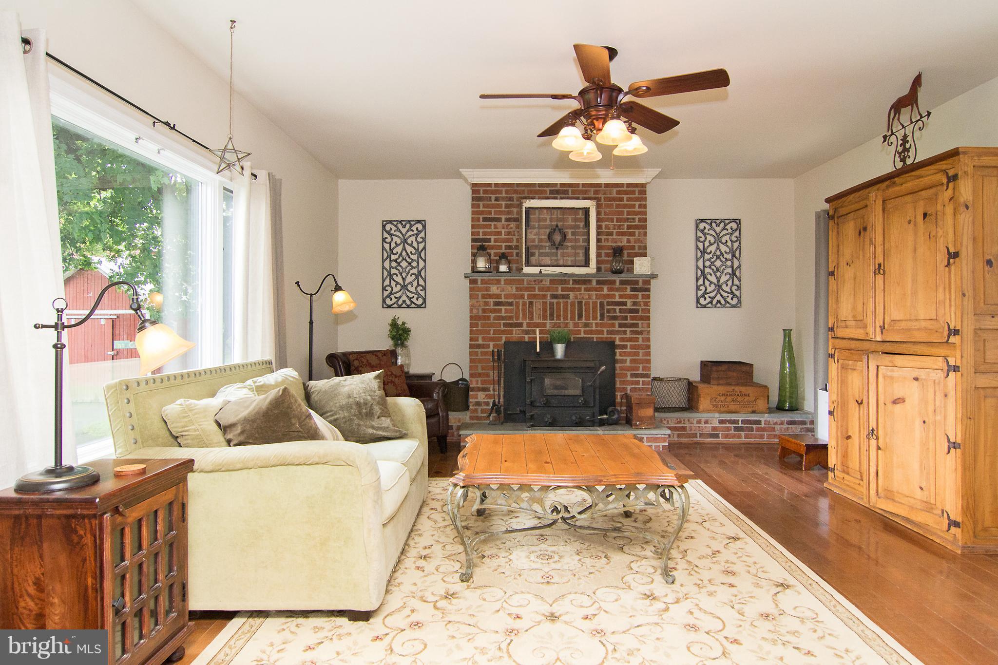 1301 Wesley Road Finksburg, MD 21048 - Photo 11 of 30 Brick hearth & wood stove insert