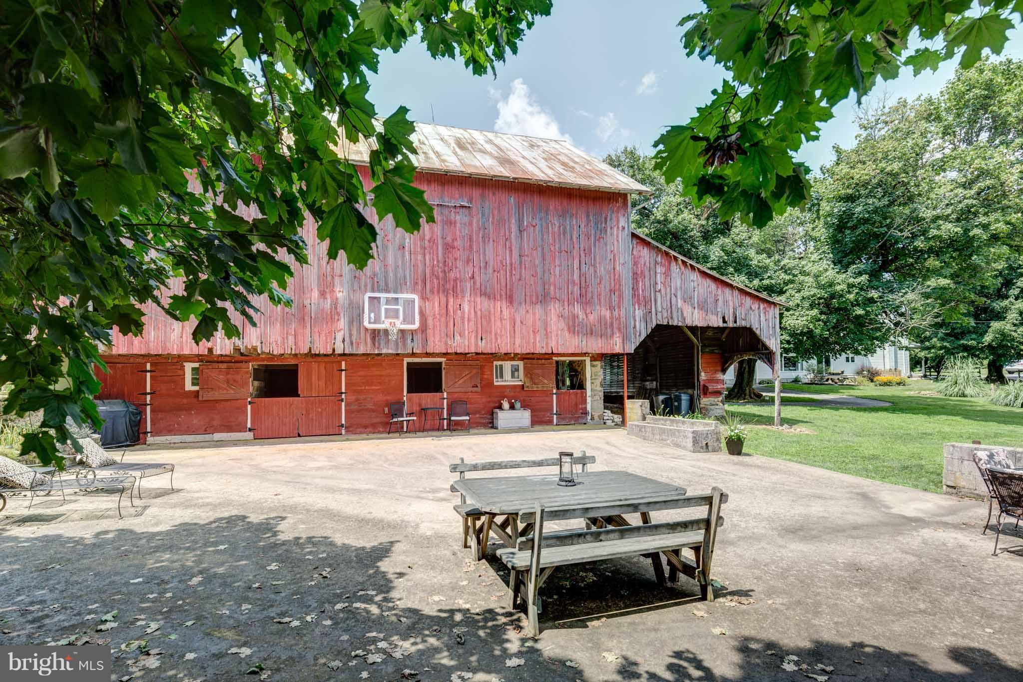 1301 Wesley Road Finksburg, MD 21048 - Photo 27 of 30 Bank Barn w/Stables and large concrete patio space