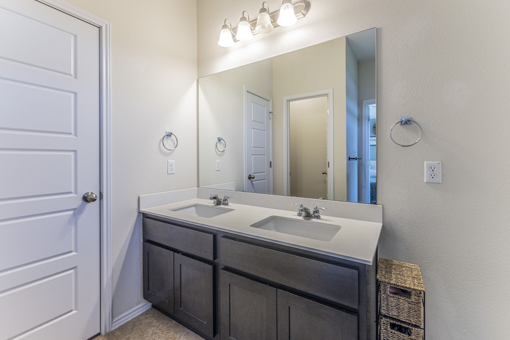 20205 Navarre Terrace Pflugerville, TX 78660 - Photo 13 of 24 a bathroom with a sink and a mirror
