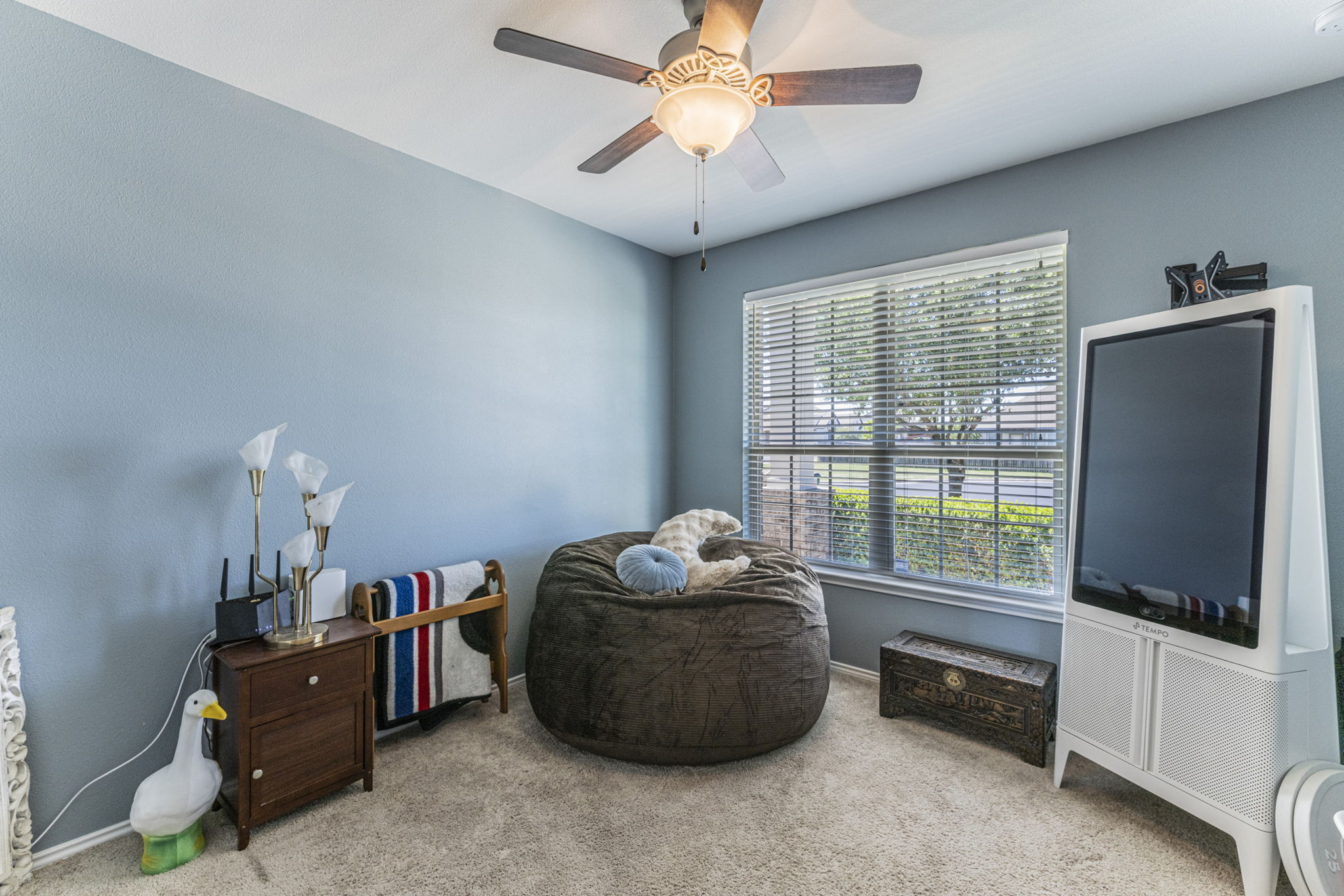 20205 Navarre Terrace Pflugerville, TX 78660 - Photo 19 of 24 a living room with furniture and a flat screen tv