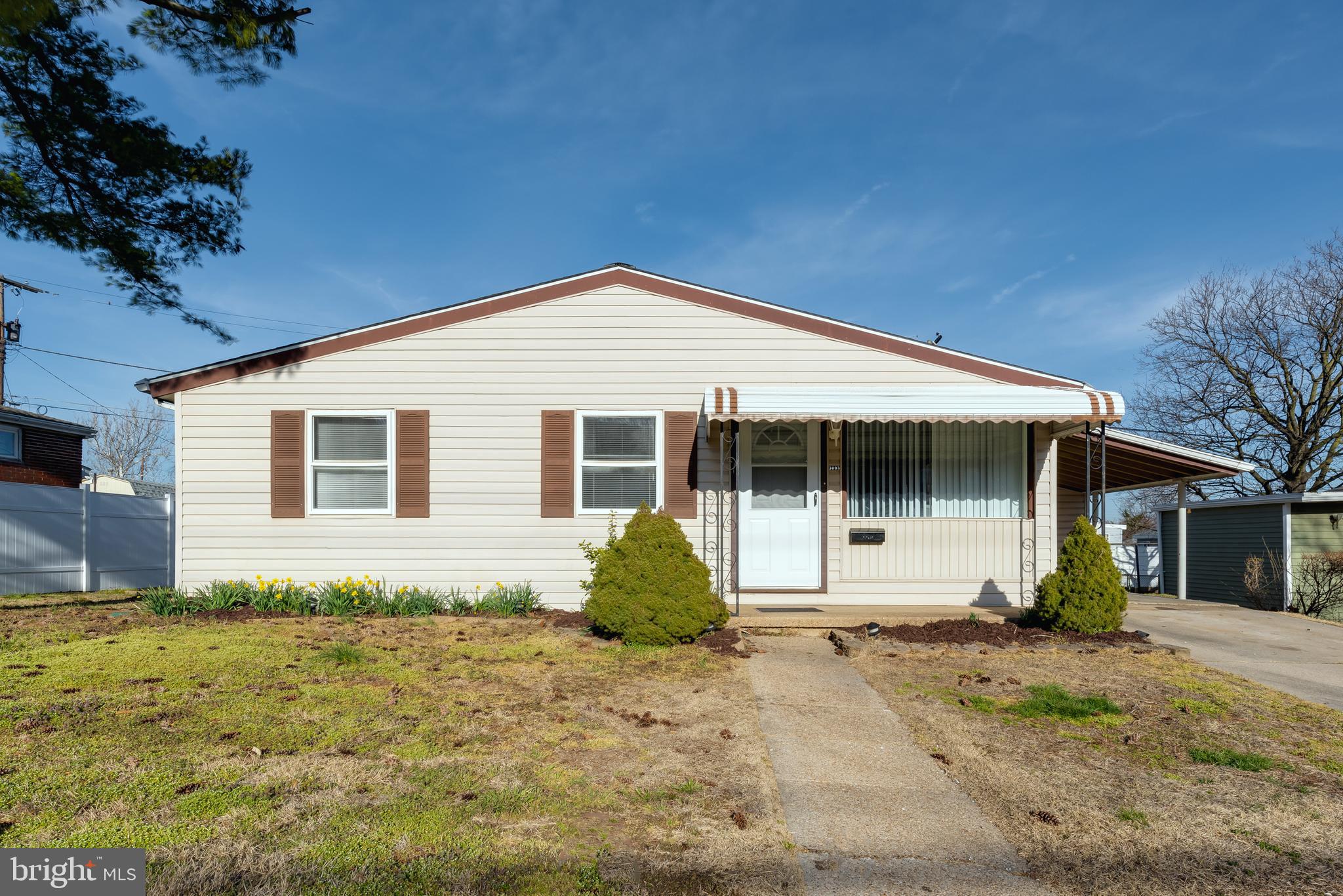 3005 Sollers Point Road Baltimore, MD 21222 - Photo 28 of 33 a front view of a house with garden