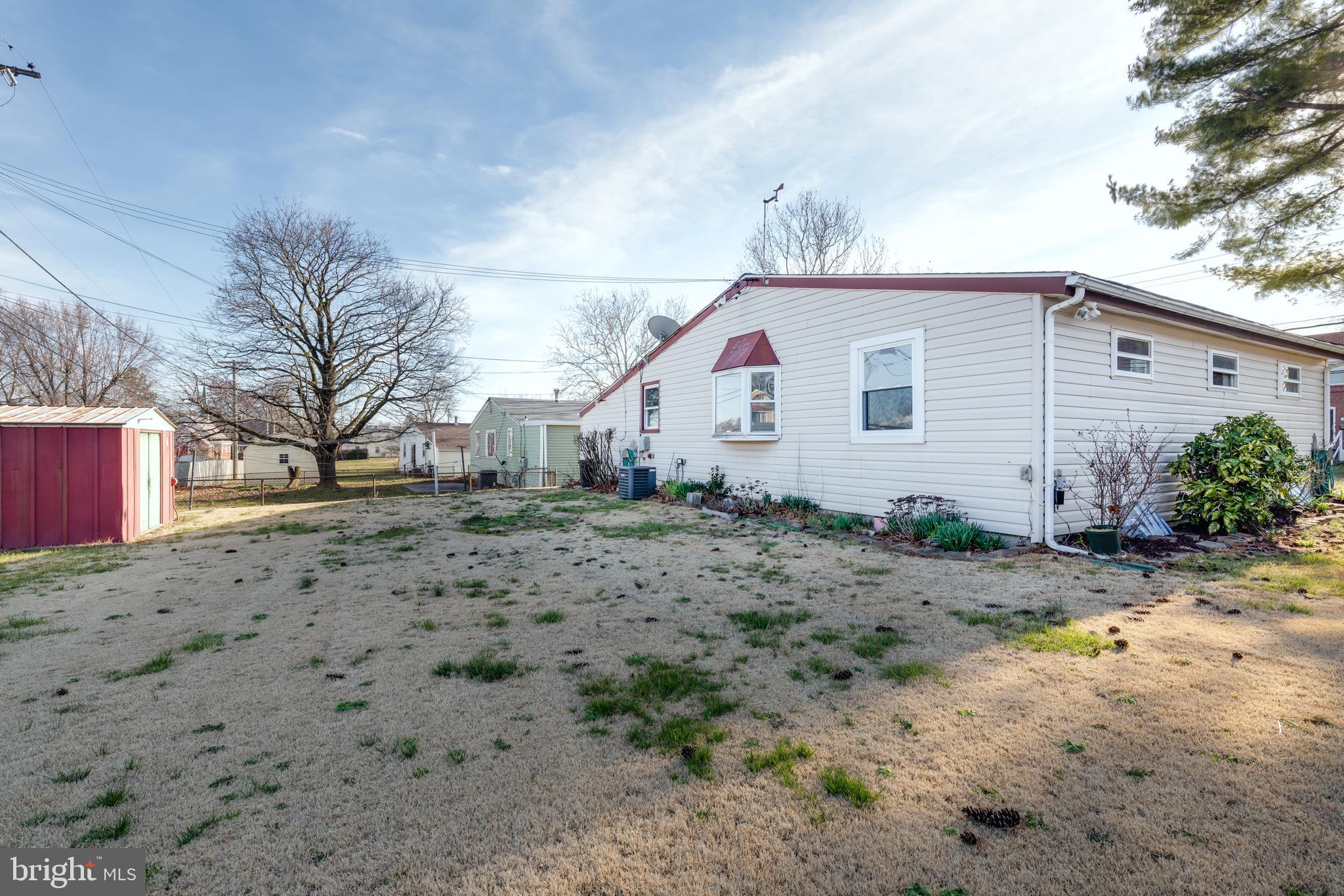 3005 Sollers Point Road Baltimore, MD 21222 - Photo 30 of 33 a view of a yard with a house