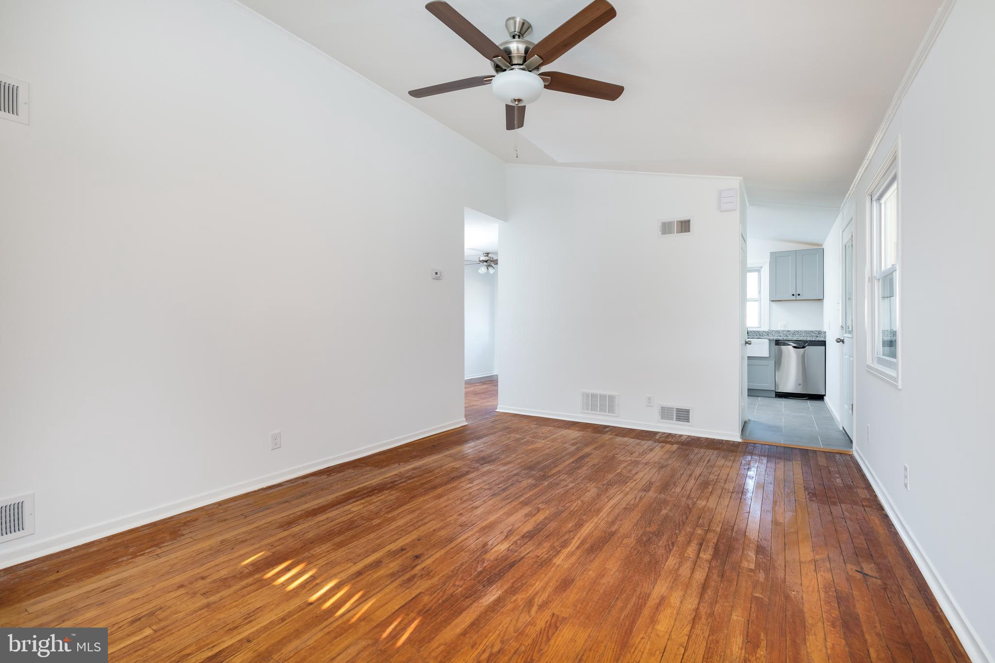 3005 Sollers Point Road Baltimore, MD 21222 - Photo 8 of 33 a view of empty room with wooden floor