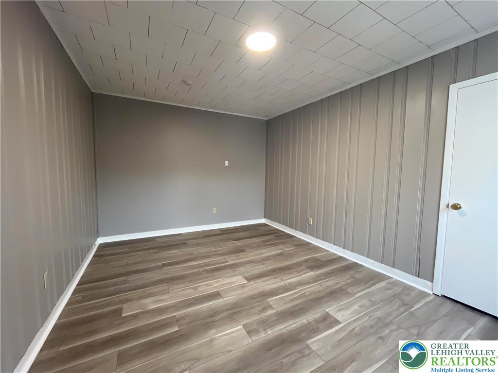 1222 Main Street, Unit 1 Northampton, PA 18067 - Photo 6 of 11 a view of empty room with wooden floor