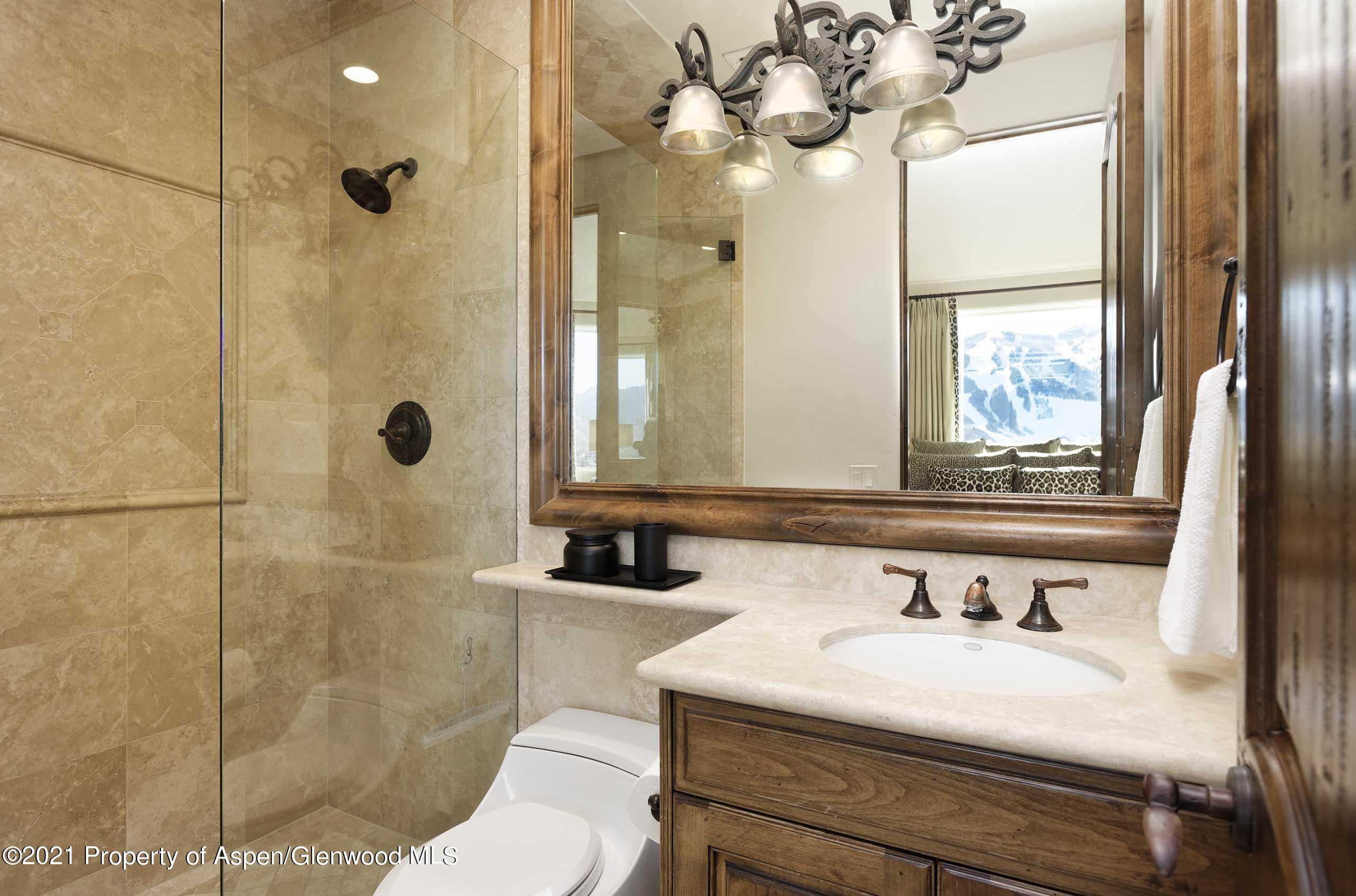 476 Wrights Road Aspen, CO 81612 - Photo 15 of 37 a bathroom with a sink a toilet and shower