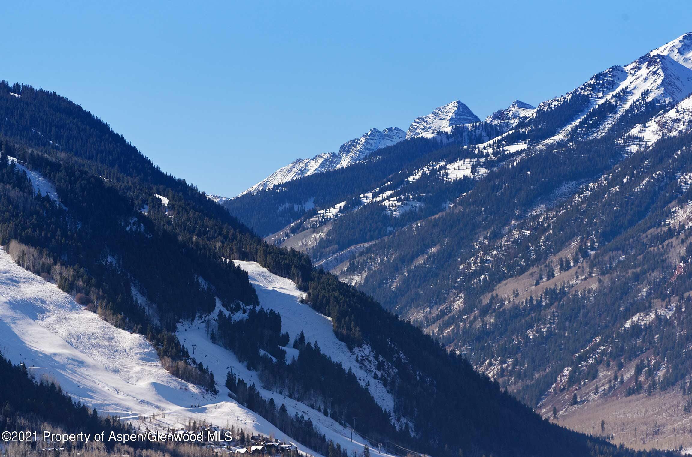 476 Wrights Road Aspen, CO 81612 - Photo 28 of 37 a view of a city with lots of trees