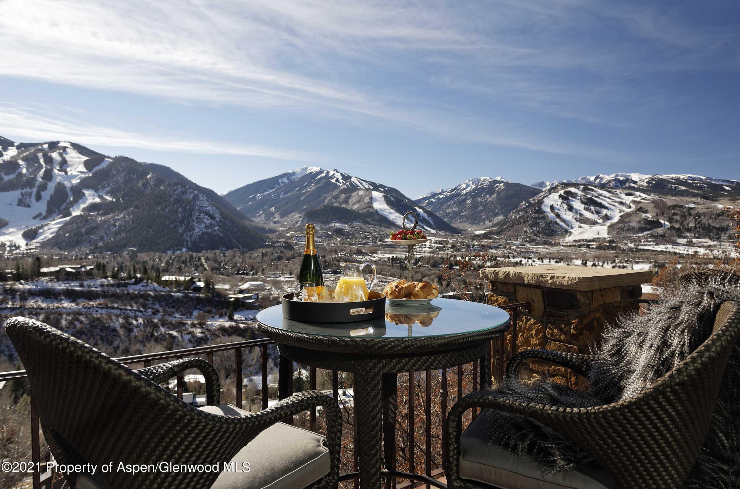 476 Wrights Road Aspen, CO 81612 - Photo 3 of 37 a view of a chairs and table in the patio