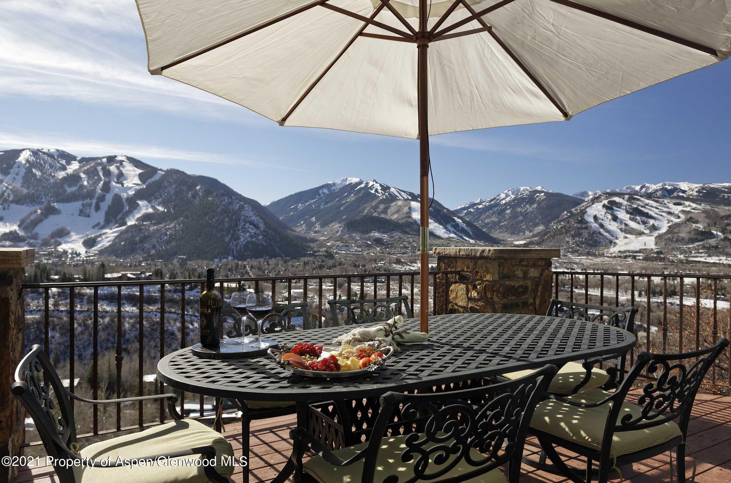 476 Wrights Road Aspen, CO 81612 - Photo 34 of 37 a balcony with table and chairs