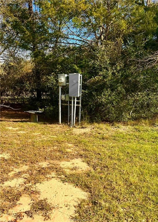 6966 Highway 7 Jewett, TX 75846 - Photo 14 of 18 a view of a swimming pool with an outdoor space and seating area