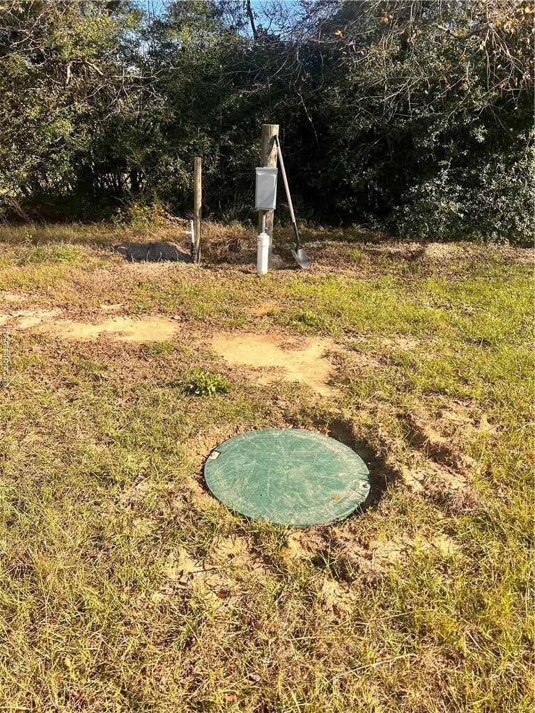 6966 Highway 7 Jewett, TX 75846 - Photo 15 of 18 a view of a swimming pool with a yard